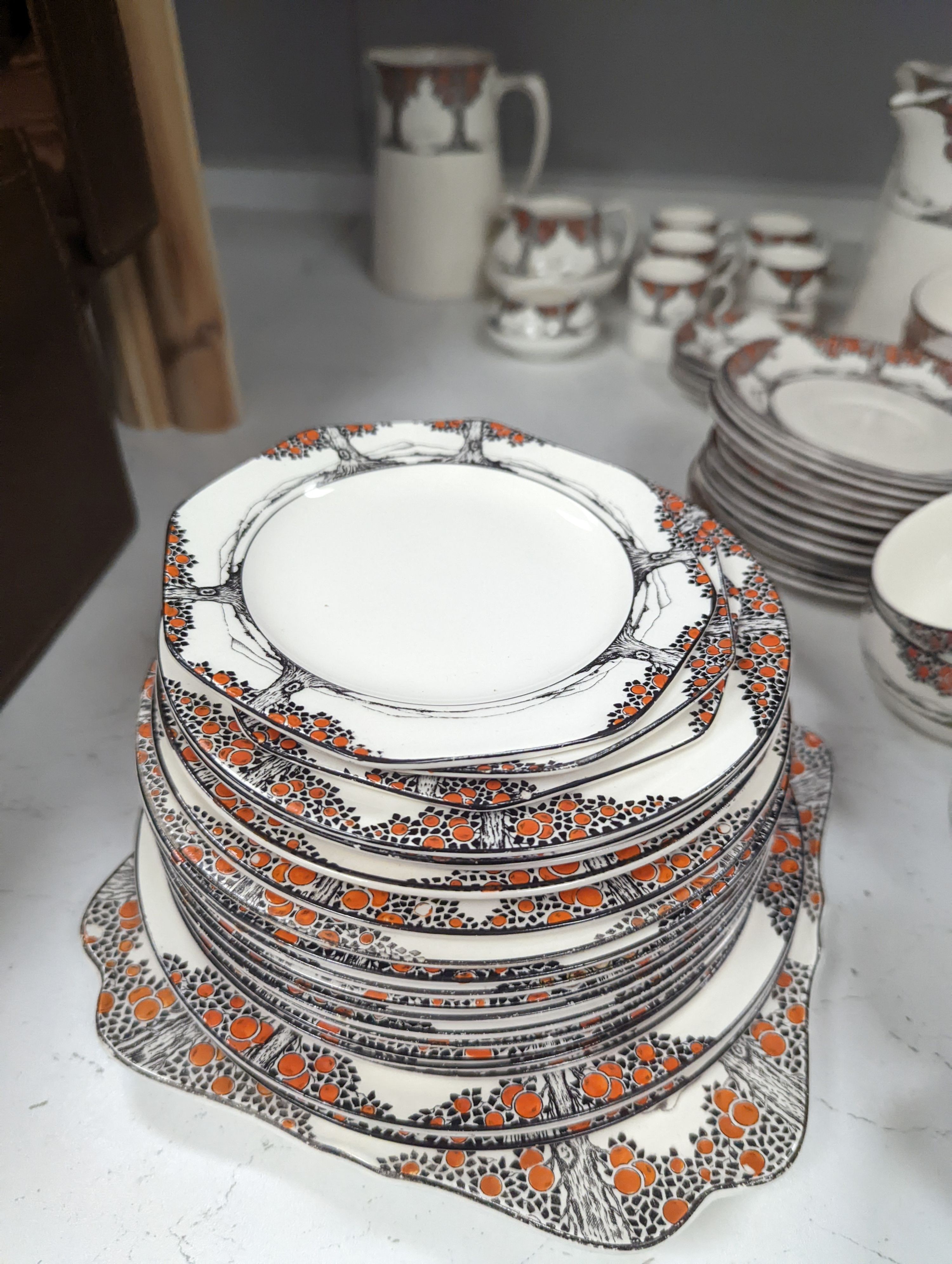 A Crown Ducal Orange Tree pattern tea, coffee and part dinner service